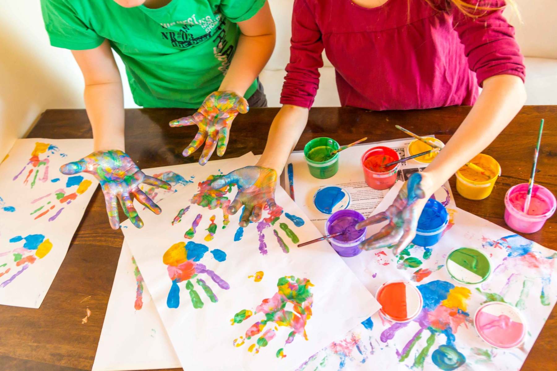girl-and-boy-playing-with-finger-paint-hand-print-2024-09-17-11-42-45-utc (1)